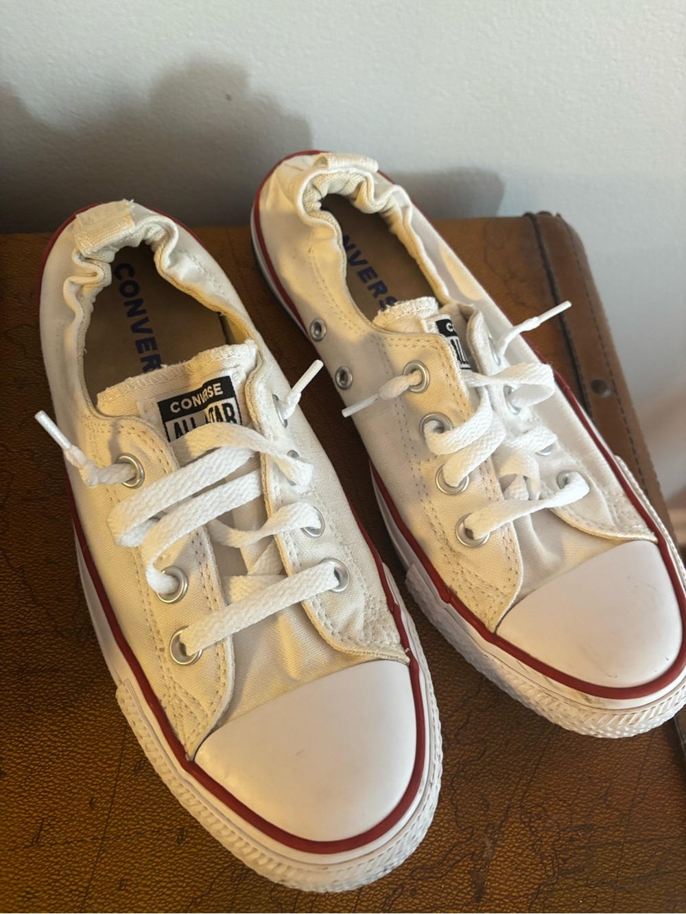 Converse White Low Top Sneakers with Red Trim